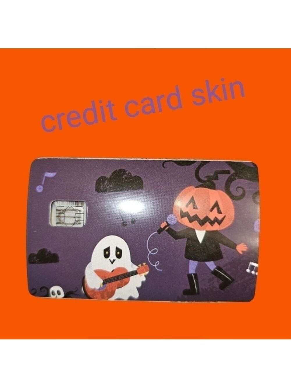 Pumpkin dancing & ghost playing guitar credit card skin for small chip cards